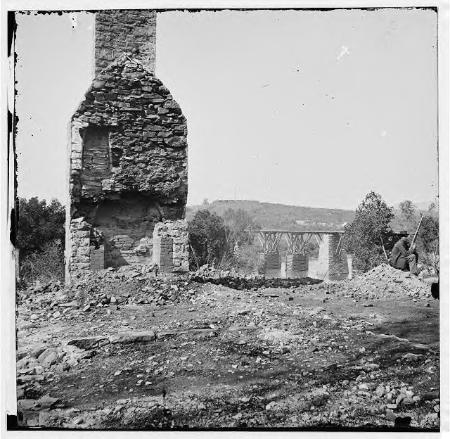 Another view of the rebuilt Strawberry Plains bridge over the Holston River, about 20 miles north of Knoxville, on the East Tennessee & Virginia RR Notice the wood cribs in mid-river and the stone pier to their right.