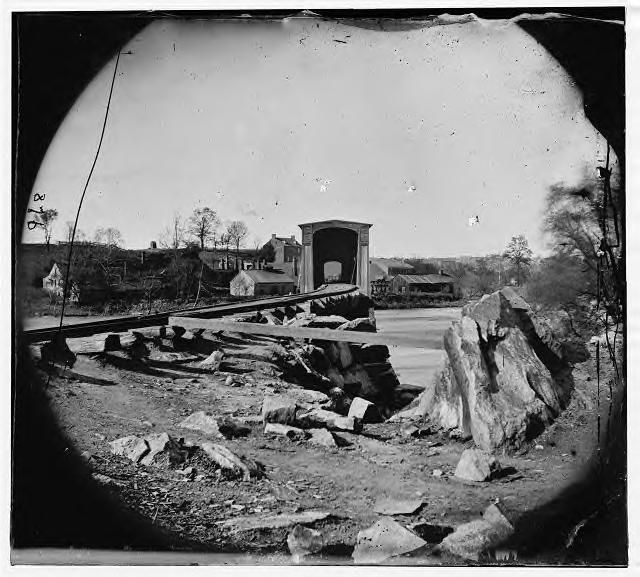 Another view of the Richmond & Danville RR bridge onto Belle Isle. Notice the size of the ties and the vertical side still retaining its bark.