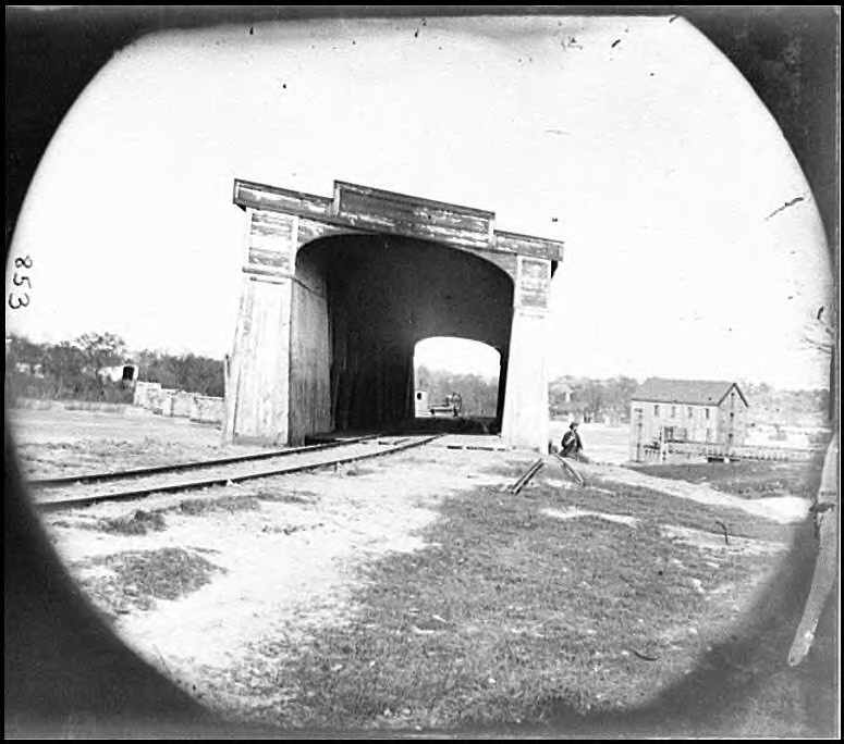 The approaches to the Richmond & Danville RR bridge into Richmond. To the left are the stone pilings that remain after the bridge was destroyed.